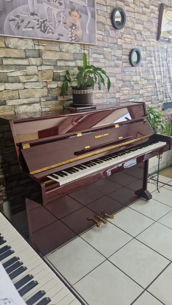 #147606  Hermoso Piano SCHAFER & SONS color Cherry Compacto.
