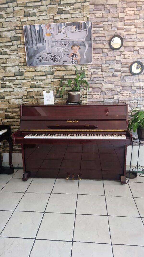 #147606  Hermoso Piano SCHAFER & SONS color Cherry Compacto.